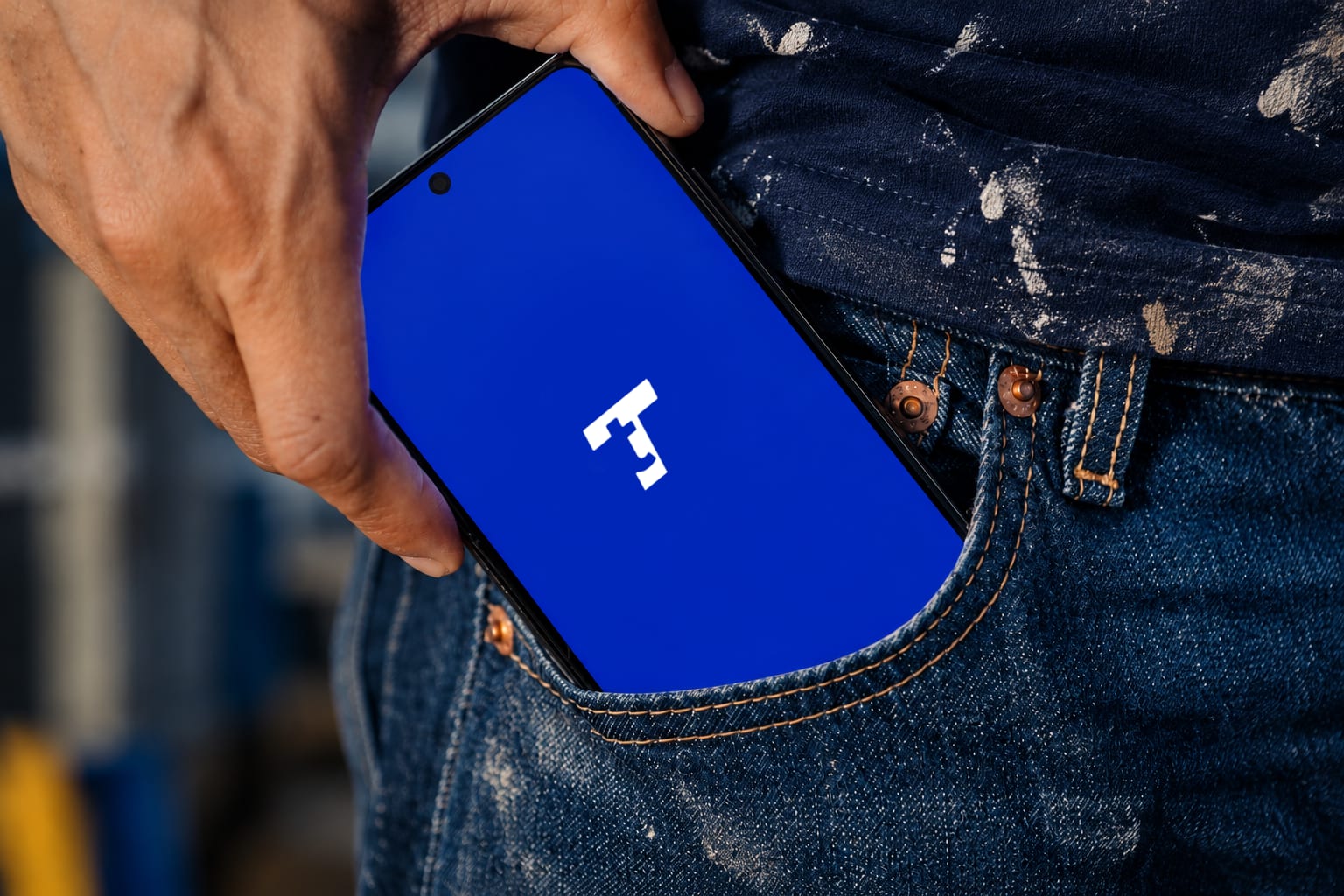 Total Tradesmen app on a phone