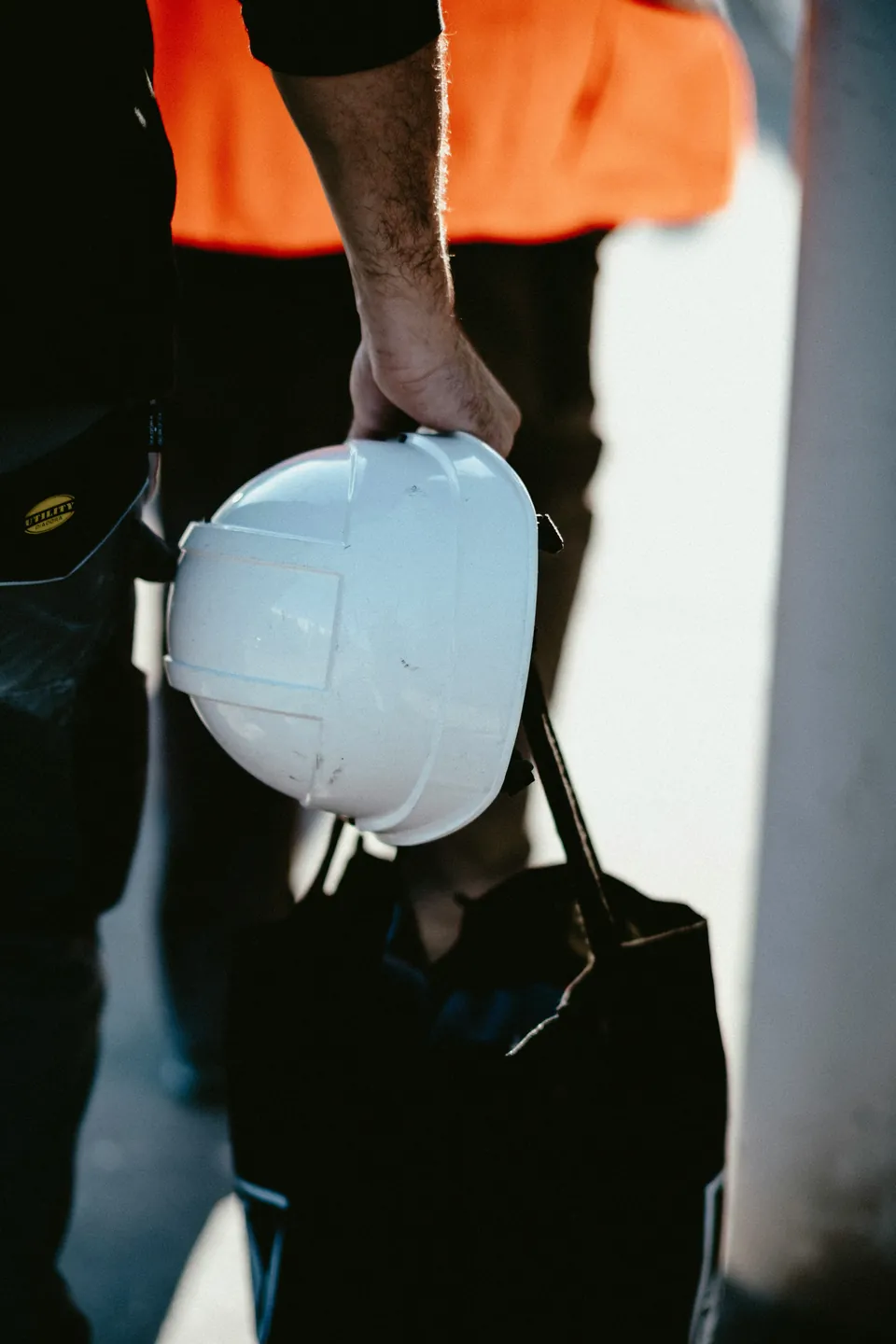Hard hat and tools on site