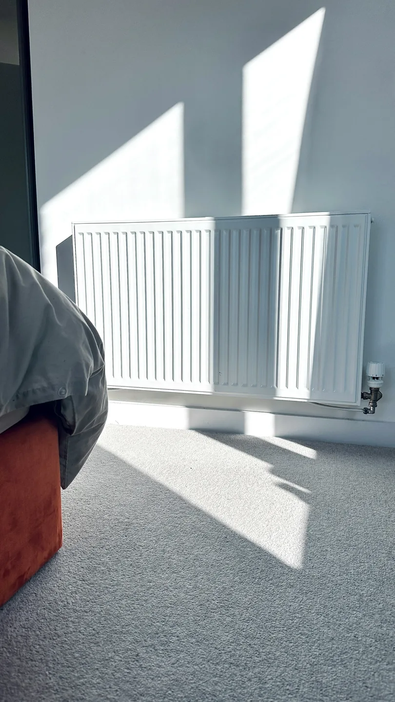 Modern panel radiator in a home